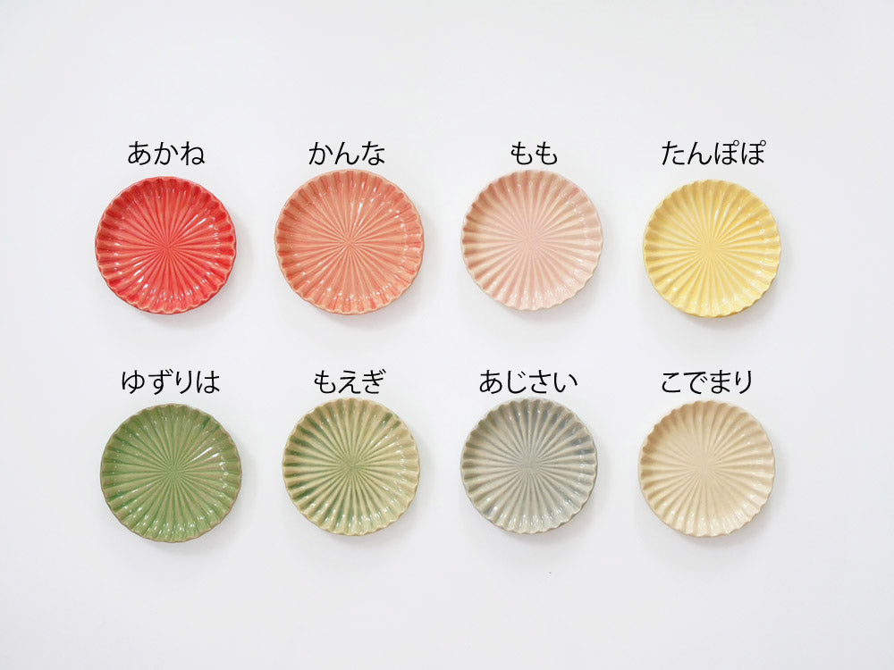 俊峰陶苑製の花あかり丸箸置。手作り陶器で自然な風合いと花模様が特徴的な丸型の箸置きです。