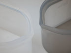 透明なプラスチック製フードストレージコンテナにシルバー蓋が付いたZip Topのジップトップディッシュ